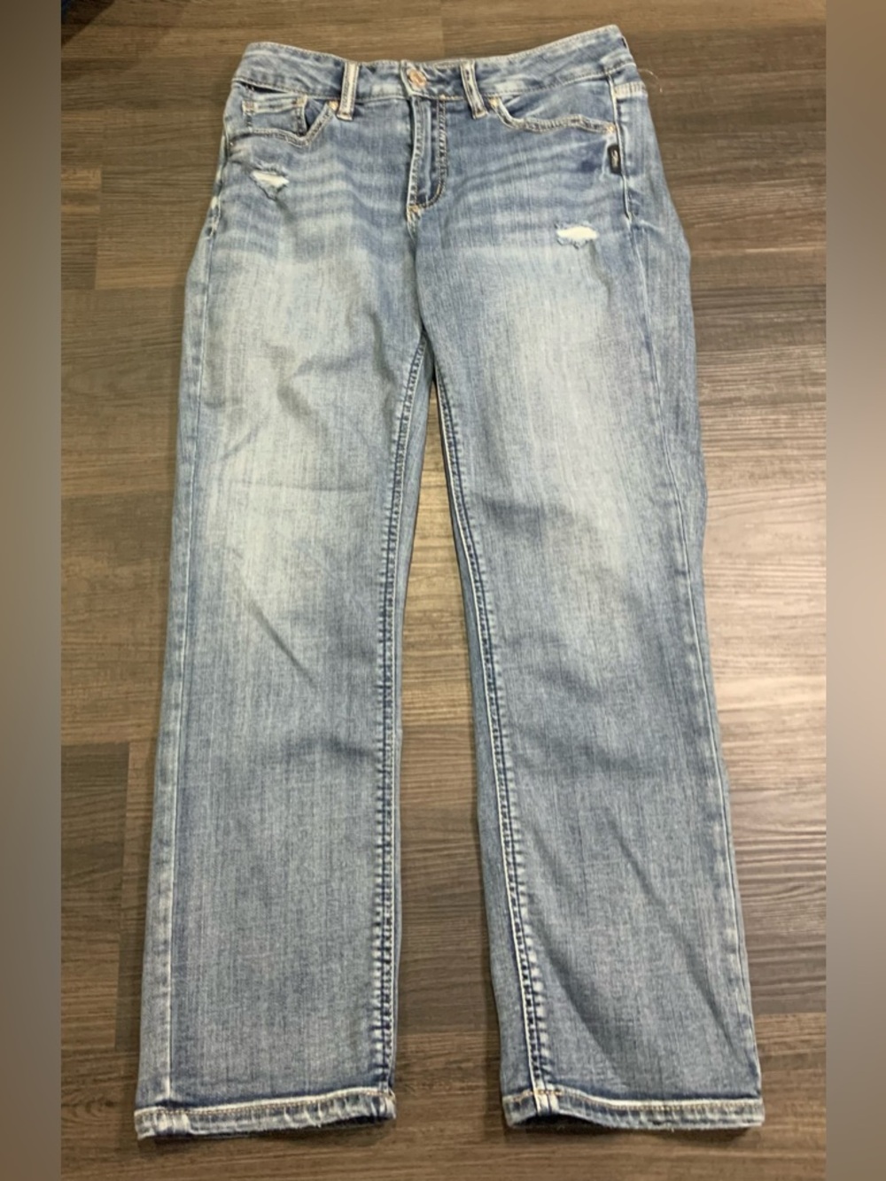 Silver Jeans Light Wash Straight Leg Jeans with Subtle Distressing